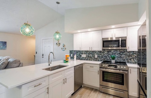 Holmes Beach House | Home with heated pool, spa, games, walk to beach