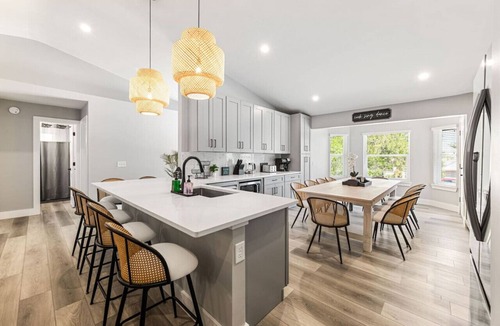 Vilano Beach House | Huge Backyard, EPIC Game Room, Heated Pool, Beach, Hot Tub, Fire Pit, Sleeps 24