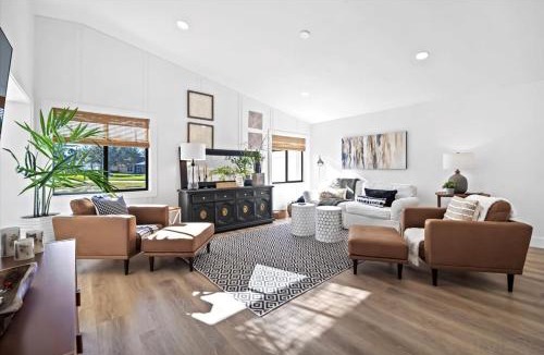 Palm Harbor House | KoKo Hut Golf Views Fenced Coastal Cottage