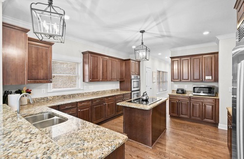 Mooresville House | Lake Escape| Lakefront 7BR retreat with pool, dock, game room, and kayaks.