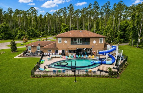 Clermont House | Lakefront Estate · Pool & Waterslide · Sleeps 45