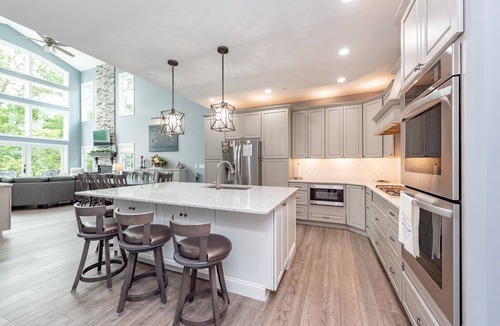 McHenry House | Lakefront Luxury w/Fireplace, Dock & Hot Tub