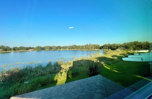 Haines City House | Lakeview Oasis w/Game Room, Screened Patio & Playground Across the Street