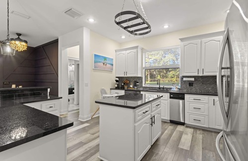 Port Richey House | Lakeview Poolside Retreat: Gated 3-Acre Paradise, Perfect for Events & Escaping!