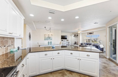 New Smyrna Beach Condo | Large Corner Unit at Ocean Walk with Sneak Peak of the Ocean ~ OW20-501