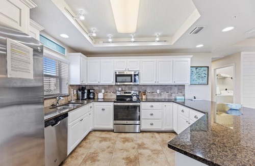 New Smyrna Beach Condo | Large Corner Unit at Ocean Walk with Sneak Peak of the Ocean ~ OW20-501