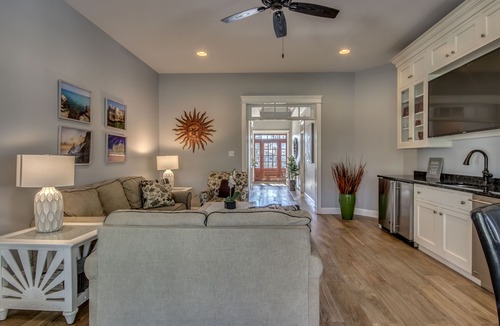 Stone Harbor House | Located just 1 ½ blocks to the beach, this distinctive property boasts seven (7) bedrooms, each with their own custom, private bath, as well as one powder room and an exquisite, solid mahogany, outdoor shower