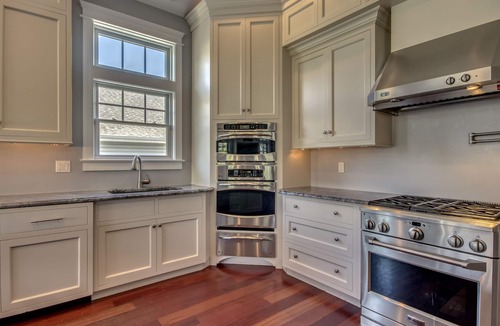 Stone Harbor House | Located just 1 ½ blocks to the beach, this distinctive property boasts seven (7) bedrooms, each with their own custom, private bath, as well as one powder room and an exquisite, solid mahogany, outdoor shower