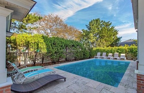 Stone Harbor House | Located just 1 ½ blocks to the beach, this distinctive property boasts seven (7) bedrooms, each with their own custom, private bath, as well as one powder room and an exquisite, solid mahogany, outdoor shower