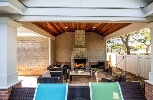 Stone Harbor House | Located just 1 ½ blocks to the beach, this distinctive property boasts seven (7) bedrooms, each with their own custom, private bath, as well as one powder room and an exquisite, solid mahogany, outdoor shower