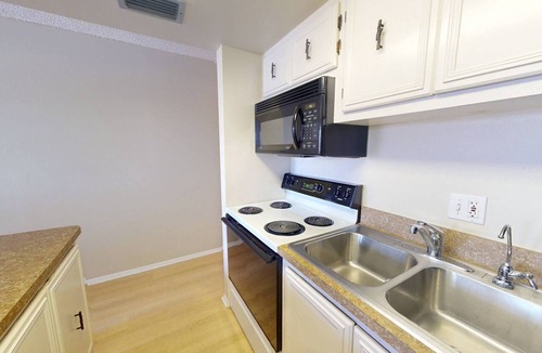 Sunset Beach Condo | Location, Location. Charming Beachside Condo. Pool, Deck Overlooking the Bay.