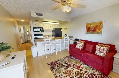 Sunset Beach Condo | Location, Location. Charming Beachside Condo. Pool, Deck Overlooking the Bay.