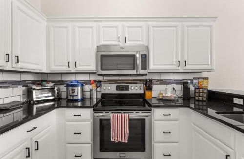 West Haven House | Luxury Disney Villa Pool Arcade & King Suites