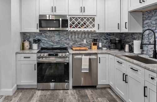 West Lealman House | Luxury Oasis w/Pool, Turf Yard, & Privacy Fence