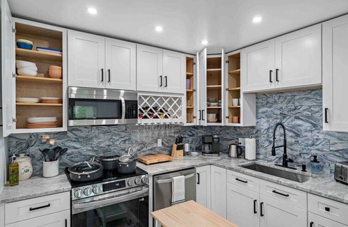 West Lealman House | Luxury Oasis w/Pool, Turf Yard, & Privacy Fence