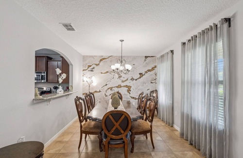 Calabria House | Magical 6BR Retreat Near Disney | Private Pool & Spa | Themed Rooms