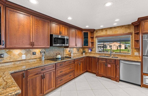 Surfside Estates House | Merritt Island Waterfront Oasis W/Private Pool, Spa-like Hot Tub & Boating Dock! 🌅