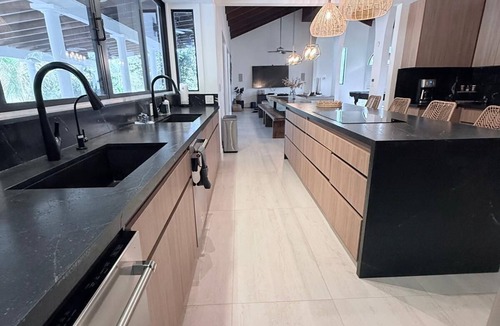 Ludlam House | Miami modern farm. Kids and family friendly. soccer, pool, tennis, pickleball.