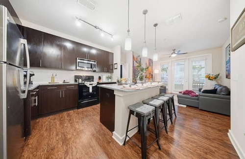 Courier City - Oscawana Apartment | Modern 2BR/2BA Tampa Retreat: Productivity Meets Comfort