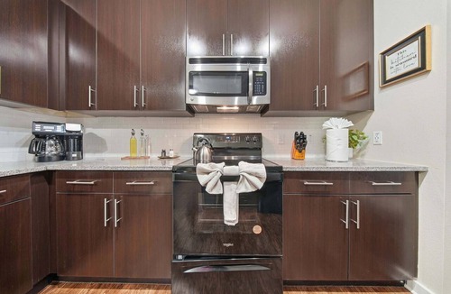 Courier City - Oscawana Apartment | Modern 2BR/2BA Tampa Retreat: Productivity Meets Comfort