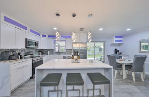 Palma Sola House | Modern Family Beach Oasis w/Heated Saltwater Pool Home, 5 miles from Anna Maria