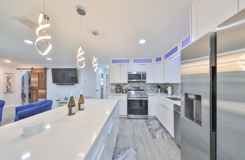 Palma Sola House | Modern Family Beach Oasis w/Heated Saltwater Pool Home, 5 miles from Anna Maria