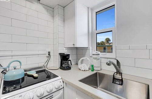 Capri Isle Condo | 🌴 Modern Studio w/Pool views Steps to Beach ➠ Tropic Terrace #50