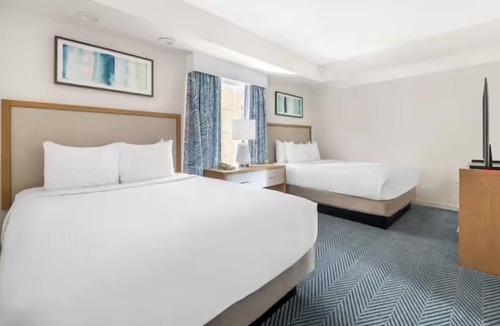 West Kissimmee Hotel | More Than a Stay—A Better Way to Travel! 2 Units with Kitchen, Outdoor Pool!