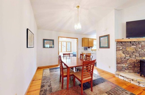 Winfield Cove House | Mountainside abode with a wood stove, firepit, grill, sunroom, AC, and W/D