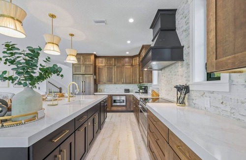 Saint Armands Key House | New 8 bedroom house with tropical oasis backyard! Heated pool and spa.