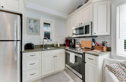 Bradenton Beach Cottage | NEW LISTING. High Tide—- Beach and Bay just steps away!