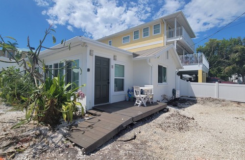 Bradenton Beach Cottage | NEW LISTING. High Tide—- Beach and Bay just steps away!