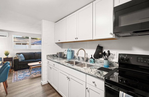 St. Petersburg - Clearwater Apartment | NEW Minutes to Downtown & Beach! Large Fenced Yard, Hammock, Fire Pit, Dining