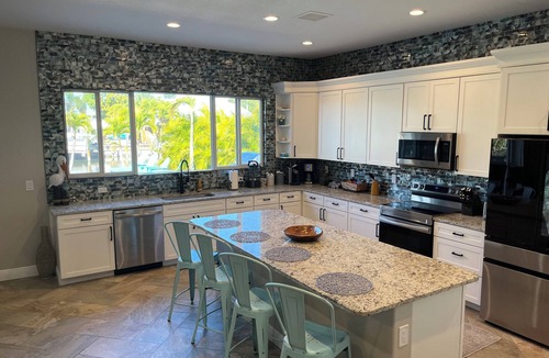 Venetian Way House | New! Waterfront home with a beautiful pool and jacuzzi