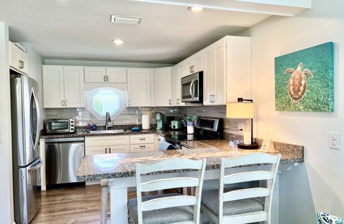 St. Augustine Beach Cottage | Newly Renovated Ground floor 1BR + Office/Den Cottage on Oceanfront Property with Pool Access, Pet Friendly