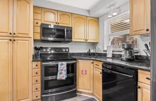 Largo House | Newly renovated outdoor space, hot tub, fire pit,minutes from the beach.