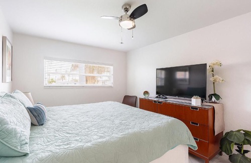 Capri Isle Apartment | Oasis Waterfront Treasure Island Condo with Patio Dock and Johns Pass