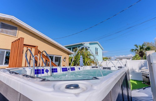 Indian Rocks Beach Cottage | Paradise by the Gulf ~ Unit A ~ 460 steps to the beach - private swim spa home.