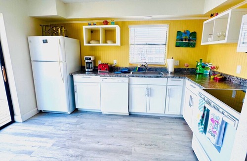Cocoa Beach Villa | Penguins on the Beach 2BR Steps to Beach & Downtown w/pool Unit 8