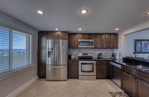 Madeira Beach Condo | Penthouse Beachfront Luxury Condo 30’ft balcony and Gulf Views @OceanSands1203