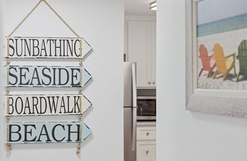 Avon By The Sea Condo | Penthouse next to the Pier. Direct ocean view. Heated pool and BBQ grills! 🌞🌴