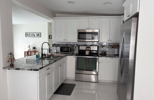 Pinecrest West Park House | Perfect Tampa Getaway! 3 Bed, 2 Bath, Pergola, BBQ Grill & Spacious Yard.