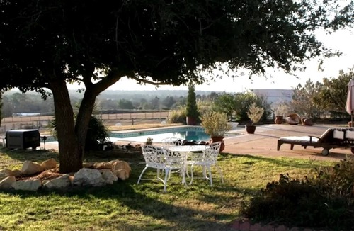 Paige Cabin | Pet-Friendly Accommodation on a Ranch in McDade, Texas