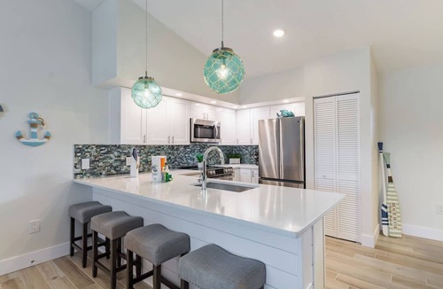 Holmes Beach House | Pool, Spa, Mini Golf, Games, Beach 4 bed 4 bath