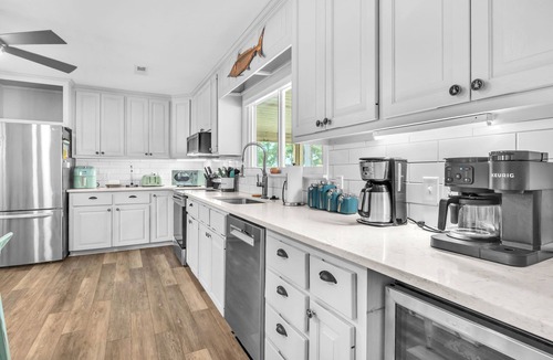 Tranquil Harbour House | Poolside Paradise: Modern Coastal Oasis with Private Backyard Pool