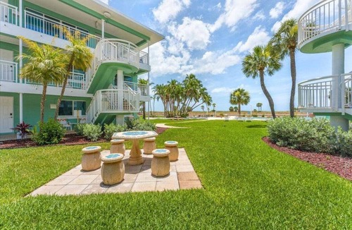 Treasure Island Condo | 🌴Poolside Studio @ Tropic Terrace | Ground Floor Steps to Beach King Bed ➠ TT10