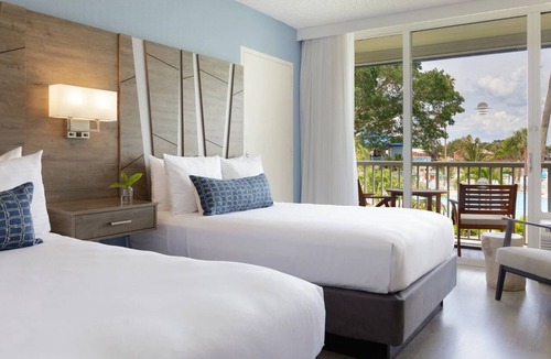 Pinellas Point Hotel | Premier Coastal Unit w/Balcony, Resort Amenities - Dining, Marina Beach Nearby