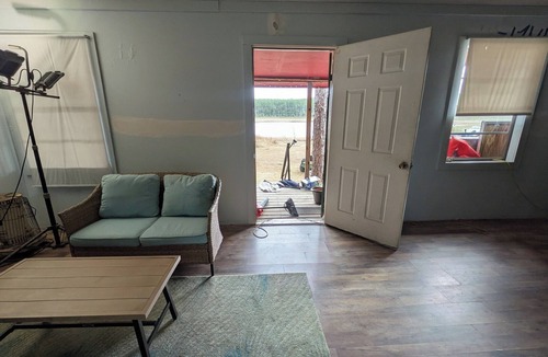 Thomas Drive Cabin | Primitive Off-Grid Fishing Cabin on 6 Acres of Florida springs lakefront