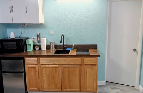 Bostwick Park Condo | Private Balcony Ocean and Pool Views Studio Condo