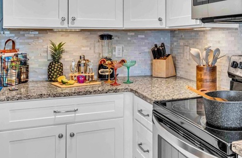 Whitfield House | Private Family Retreat |Heated Pool | Mini Golf | Game Room | Near IMG | Beaches
